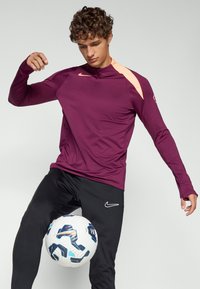 Nike Performance STRIKE T90 - Langarmshirt - bordeaux/orange pulse