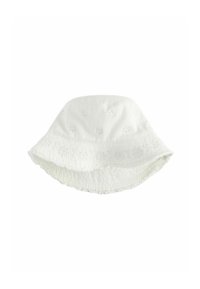 Hvid bucket hat lavet af bomuld, med broderede blomster mønstre, en bred skygge og en tekstureret, frynset kant.