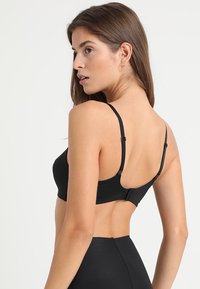 Calvin Klein Underwear UNLINED  - Trikotni modrček - black