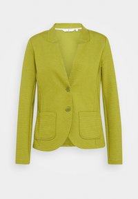 Blazer vert, à côtes, avec un col cranté, deux poches avant et fermeture à double bouton. Texture lisse avec un design ajusté.