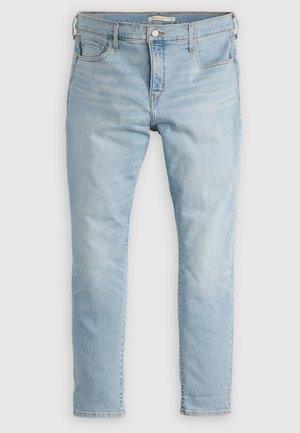 Jeans in denim azzurro chiaro con vestibilità slim, cinque tasche e chiusura con bottone. Presentano un leggero effetto sbiadito e cuciture a contrasto lungo le cuciture.