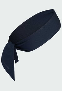 Diadema de tela texturizada en azul oscuro con detalle de nudo, diseñada para absorber la humedad y enfriar durante deportes o entrenamientos.