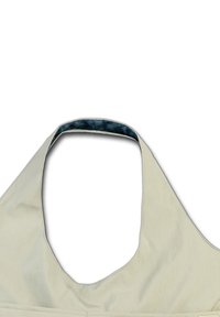 Beige haltertop met een gebogen halslijn en een contrasterende blauwe binnenvoering. De stof lijkt glad met minimale stikdetails.