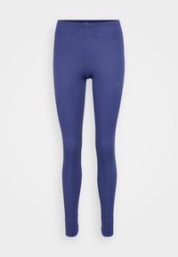 Blå helfargede slim-fit tights med flate sømmer og et mykt elastisk stoff, vist på en enkel hvit bakgrunn.