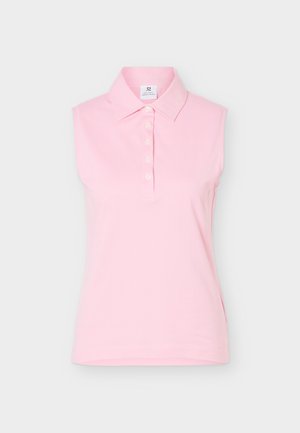 Αμάνικο απαλό ροζ πόλο πουκάμισο με κλασικό γιακά και μπροστινή πατιλέτα με πέντε λευκά κουμπιά.