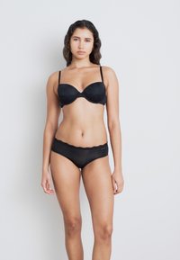 Black lingerie set featuring a padded bra with lace trim and adjustable straps, paired with black hipster panties with lace details.
