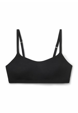 Zwarte bralette met verstelbare bandjes, naadloos ontwerp en een zachte, gestructureerde stof. Eenvoudige silhouet zonder hardware of versieringen.