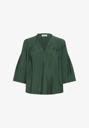 Zöld, könnyű top V-nyakkivágással, háromnegyedes ujjakkal és vállon gyűrődő részletekkel. Simító, enyhén fényes anyagból készült.
