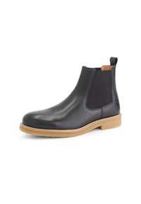 Zwarte leren Chelsea-boots met elastische zijpanelen, een afgeronde neus en een lichtbruine rubberen zool met een gestikte rand.