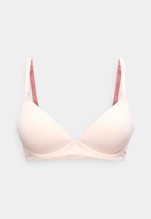 Ροζ ελαφρώς μαλακό στηθόδεσμο με εκχυμωμένες κύπελλες, ρυθμιζόμενους ιμάντες σε πιο σκούρο ροζ και μικρό λογότυπο Puma στο κέντρο της ταινίας.