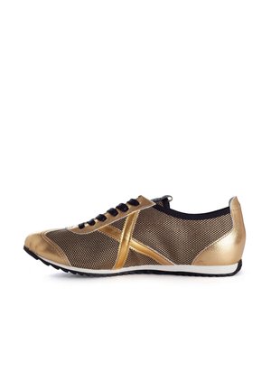 Zapatillas dorados de hombre en Zalando