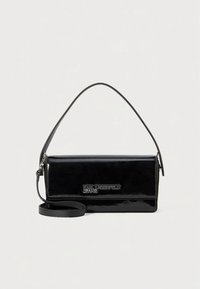 Black patent leather handbag with a rectangular design, detachable shoulder strap, and a front logo accent. Smooth texture, minimalistic style.