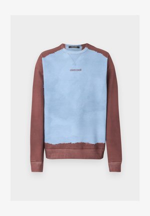 Kaelusall koos helerohelise keskmise osaga ning pruunide varrukate, krae ja alumise äärega, rinnal "roberto cavalli" logo.