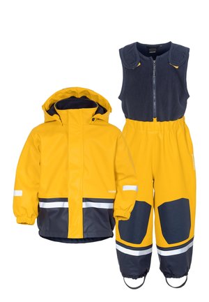 Regnbyxor - oat yellow