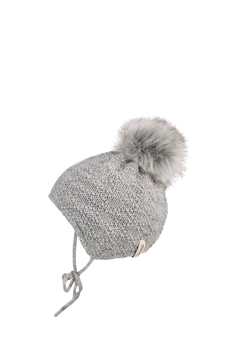 Gray knitted winter hat with earflaps, tied strings, and a large fluffy pom-pom on top against a white background.