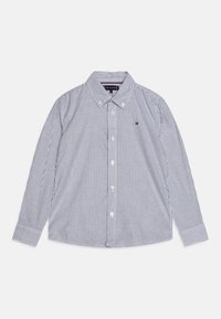 Camicia a maniche lunghe a righe blu navy e bianca, con colletto a punta, bottoni frontali e un piccolo logo sul petto. Tessuto di cotone.