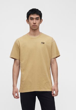Nike Sportswear, TEE UNISEX - Camiseta estampada - parachute beige