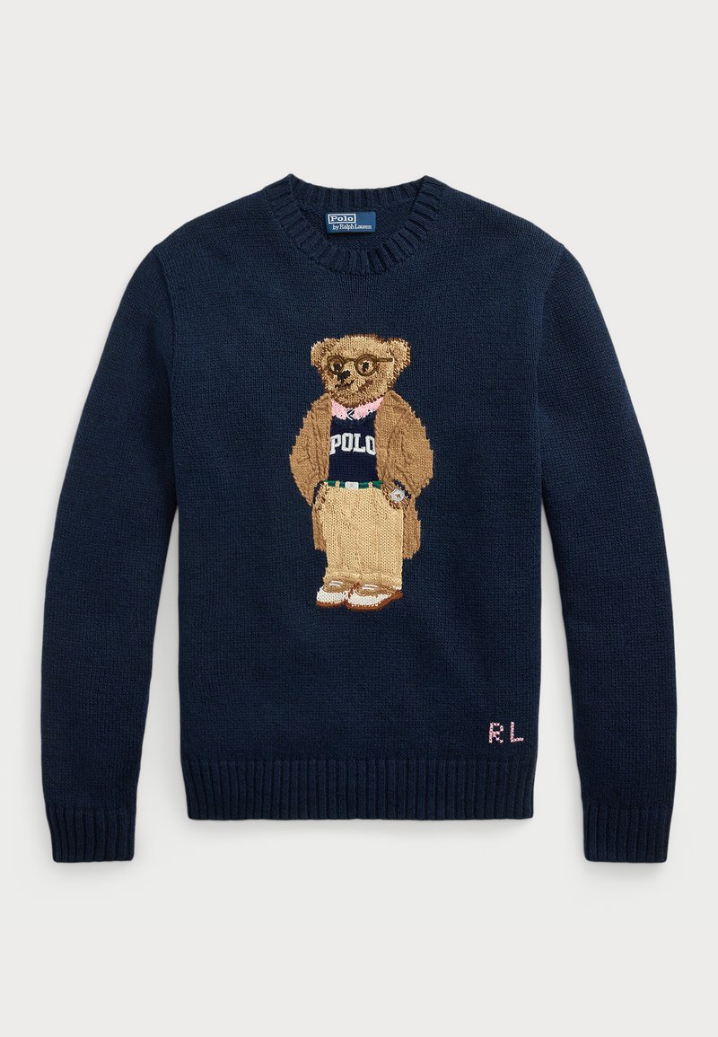 Mornarska pulover s velikim vezenim medvedom v očalih, oblečenim v "Polo" majico, khaki hlačah in supergah. Ribbani manšeti in rob.