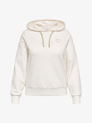 Hele helekreemjas toonis kapuutsiga pusa, valmistatud pehmest kangast. Omab metallik-kuldseid paelakesi ja väikest südameembleemi rinnal.