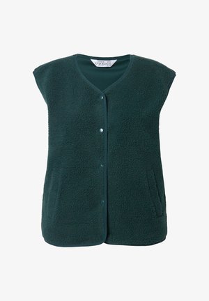 Fleecepaita tummanvihreänä, jossa on V-pääntie, lyhyet hihat, edessä nappilukitus ja kaksi sivutaskua. Pehmeä tekstuuri ja ylellinen viimeistely.