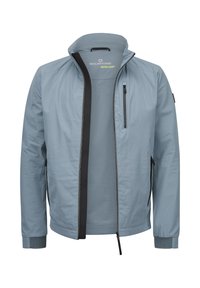 Helle blaue Jacke aus glattem Stoff, mit hohem Kragen, frontalem Reißverschluss und zwei Reißverschlusstaschen. Text-Logo im Inneren.