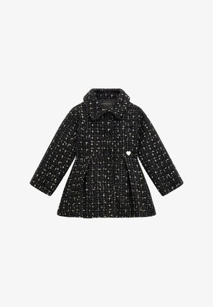 Manteau pour enfants en tweed noir et blanc, avec manches longues, boutons sur le devant, col, et un petit détail en forme de cœur blanc sur la poitrine.