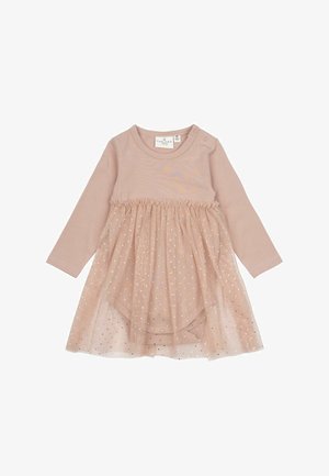 Long-sleeve infant dress in soft blush fabric, featuring a ruffled waist and a sheer overlay with gold polka dots. Snap buttons at shoulder.