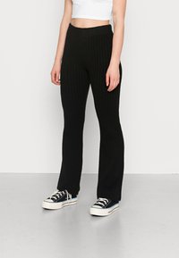 NA-KD SOFT PANTS - Calças - black