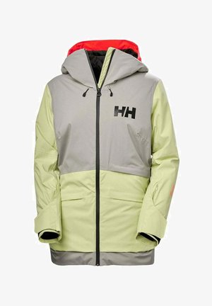 Lichte waterdichte jas in grijs en lichtgroen met een rode capuchon. Heeft een voorkleursluiting, grote zakken en een opvallend zwart logo.
