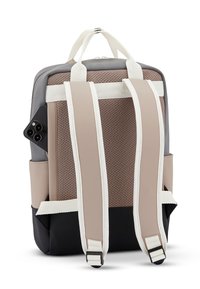 Backpack in gray, beige, and black. Textured material with mesh panel. Adjustable white straps and side pocket for phone. Simple, modern design.
