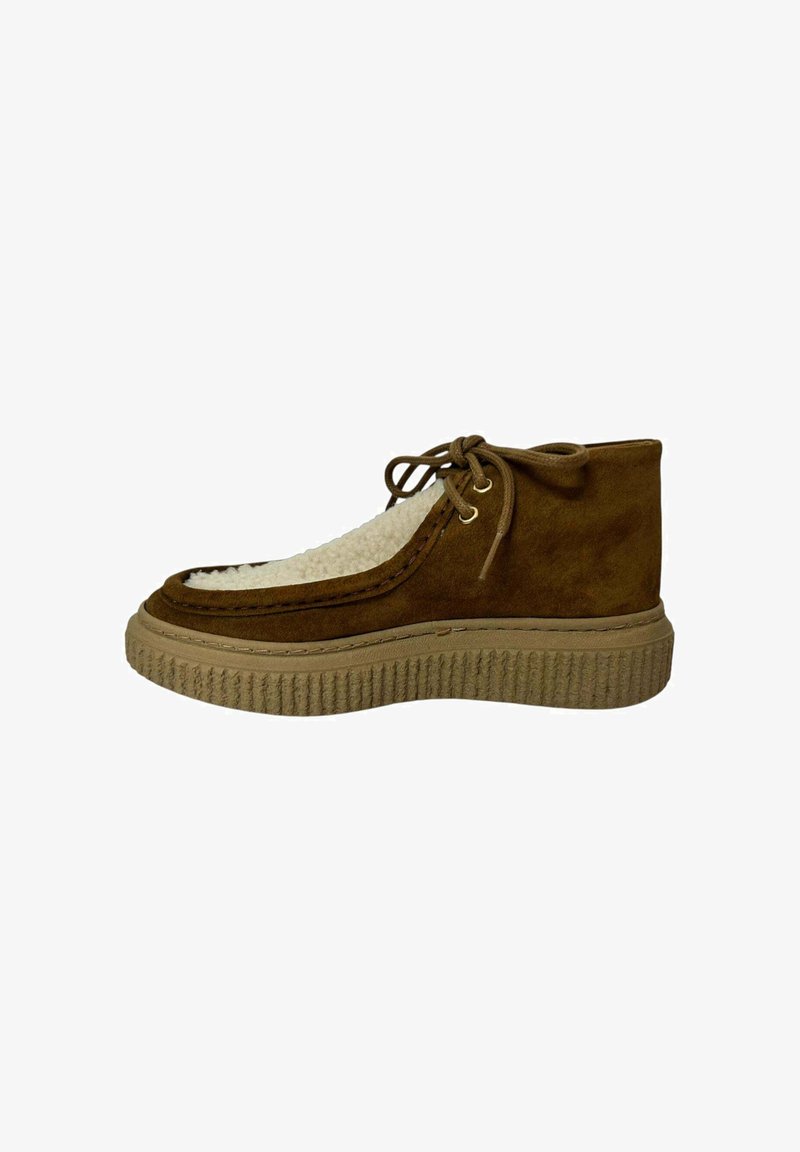 Brown suede ankle boot with a textured cream wool panel, rounded toe, rubber sole, and lace-up closure with gold eyelets.