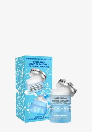 Mini-size blue packaging features two jars of moisturizers with white lids. Text includes product names and descriptions in bold typography.