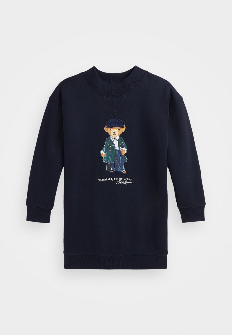 Laivastonsininen collegepaita, joka on valmistettu puuvillasekoitekankaasta. Edessä värikäs brodeerattu pukuun pukeutunut karhukuva. Pyöreä pääntie ja resorit hihansuuissa.