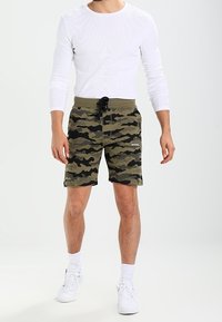 Diesel Teplákové kalhoty - olive