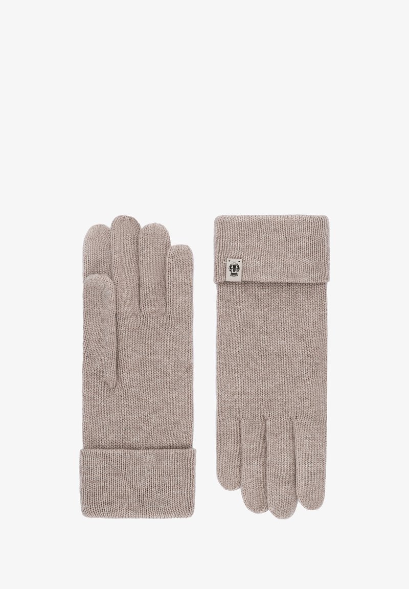 Ein Paar beigefarbene gestrickte Handschuhe mit umgeschlagenen Bündchen, einer zeigt die Vorderseite und der andere die Rückseite mit einem kleinen rechteckigen Logo-Tag.