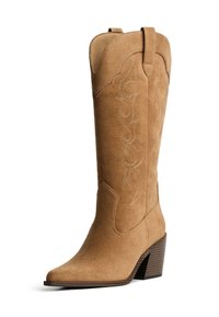 Tan mockaskinn cowboy boots med spetsig tå, dekorativ sömnad och en staplad klack. Har dragtaggar för enkel påtagning.