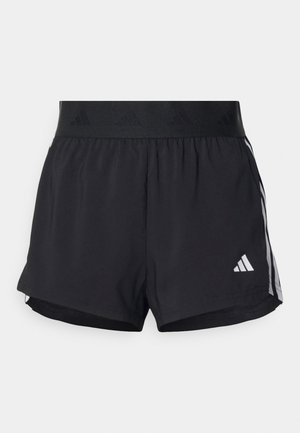 Black athletic shorts with an elastic waistband, featuring a textured band, side stripes, and a white Adidas logo on the lower hem.