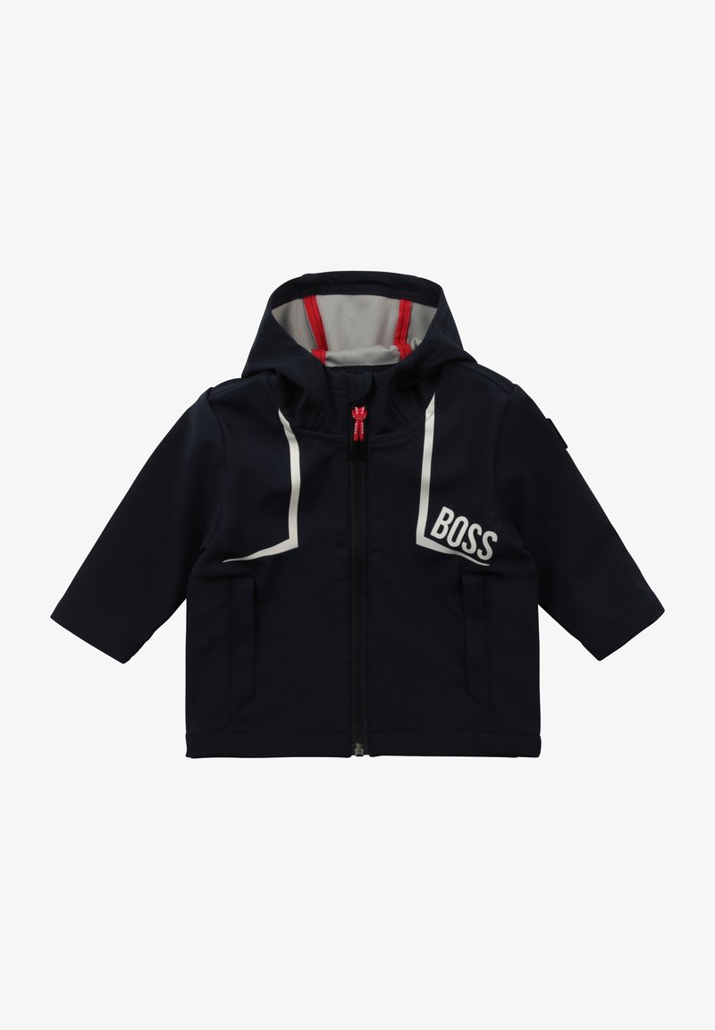 Navy blue children's jacket with a hood, features red accents and a gray inner lining; white logo and zipper detailing on the front.