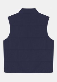 Gilet senza maniche blu navy con colletto alto, caratterizzato da dettagli di cucitura orizzontale e una texture liscia, ideale per il layering.