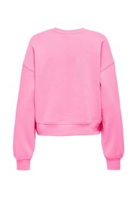 Ροζ κοντή μπλούζα από μαλακό ύφασμα. Διαθέτει μακριά μανίκια, μανσέτες με ριμπ και στρογγυλή λαιμόκοψη. Απαλή υφή, απλός σχεδιασμός.