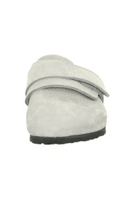 Light gray, textured suede shoe with two adjustable Velcro straps and a black rubber sole, designed for ease of wear and comfort.