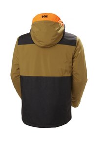 Veste imperméable pour homme avec un design en blocs de couleurs marron, noir et orange. Comprend une capuche et un logo bien visible sur le col.