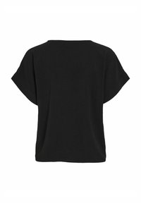T-shirt noir ample avec des manches courtes et larges. Présente un col arrondi et un tissu doux et texturé. Design simple sans ornements.