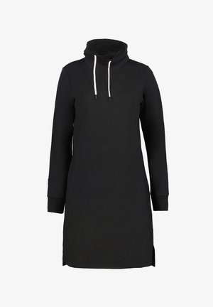 Robe sweat à capuche noire avec un col haut, des manches longues, des accents en cordon de serrage, des fentes latérales et des poignets côtelés. Fabriquée en coton doux.