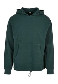 Felpa cappuccio verde scuro realizzata in materiale testurizzato, dotata di una tasca frontale, cordino regolabile all'orlo e polsini a costine.