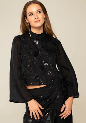 THE-ARE BLUSA DE CUELLO SUBIDO CON BORDADO Y LENTEJUELAS DE MUJER - Blusa - black