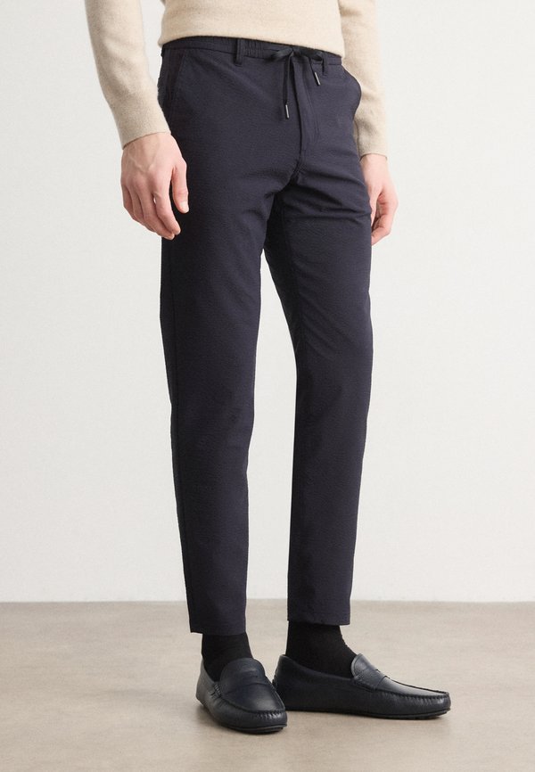 TAPERED - Trousers
