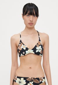 Floral bikini top with black background, featuring yellow, white, and brown flowers. Thin shoulder straps and triangle cut design.