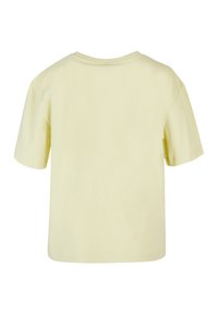 Yellow cotton t-shirt with short sleeves, a round neckline, and a relaxed fit. Smooth texture, no visible patterns or accents.