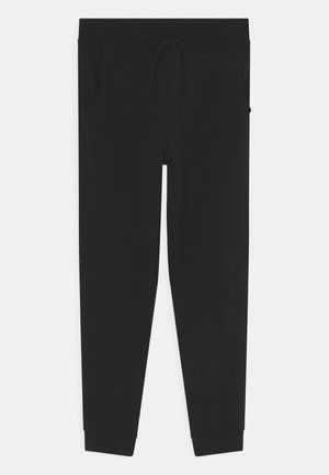 Pantalones deportivos negros con cintura elástica y cordón ajustable, bolsillos laterales y piernas ajustadas con puños acanalados. Tejido de textura suave.